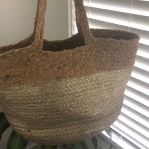 Gold woven beach bag